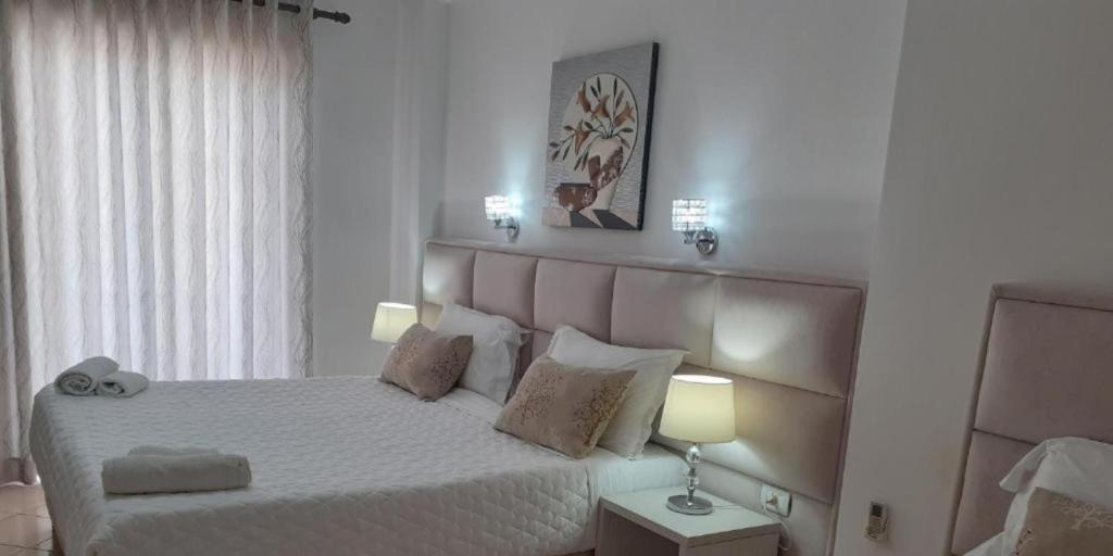 Postel nebo postele na pokoji v ubytování Ceko Hotel