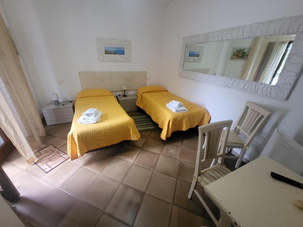 Postel nebo postele na pokoji v ubytování Hotel Dory