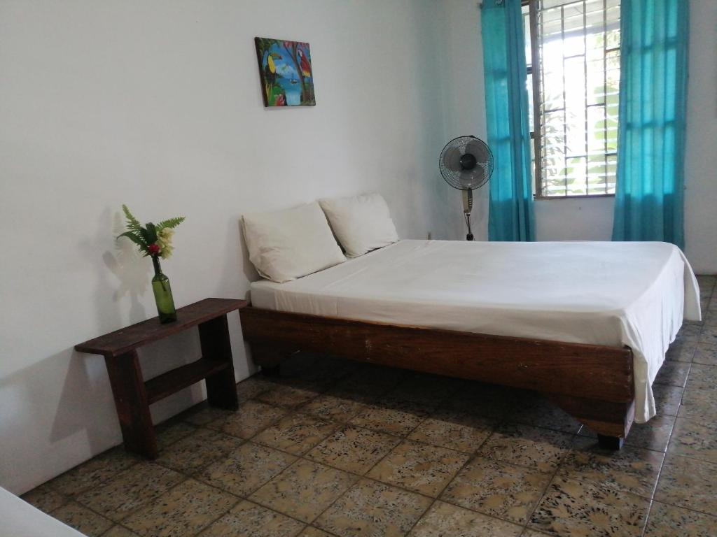 Postel nebo postele na pokoji v ubytování Rooms Palmeras