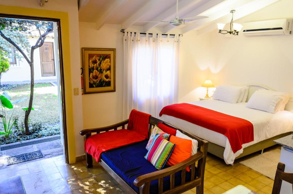 Postel nebo postele na pokoji v ubytování La Casona Hotel Boutique