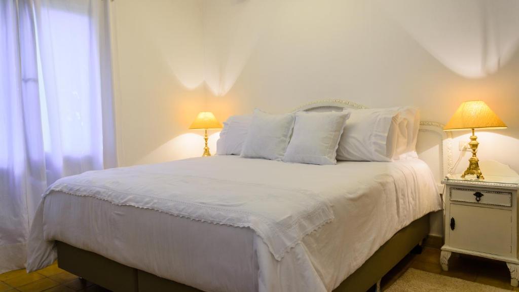 Postel nebo postele na pokoji v ubytování La Casona Hotel Boutique