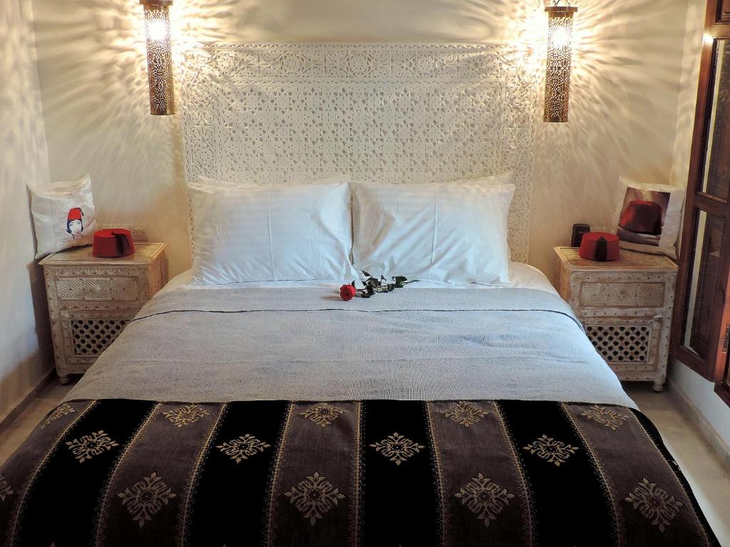 Postel nebo postele na pokoji v ubytování Riad Nirvana