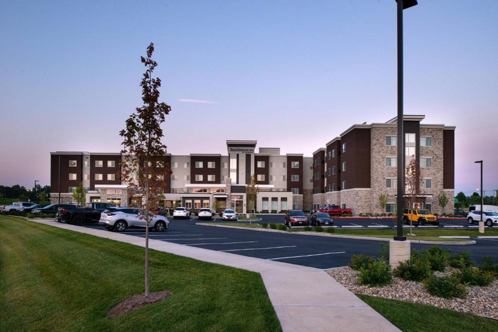 a parking lot in front of a large building at Residence Inn by Marriott St Louis Chesterfield in Chesterfield