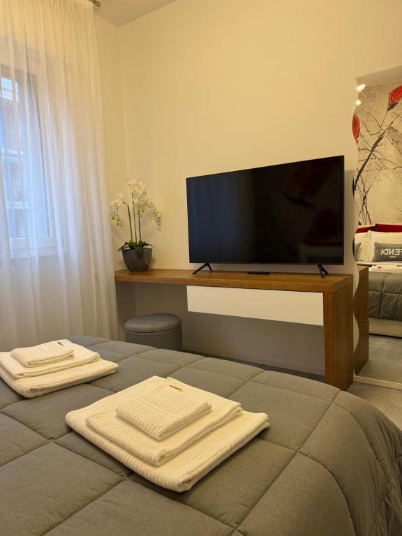 TV a/nebo společenská místnost v ubytování B&B Prestige