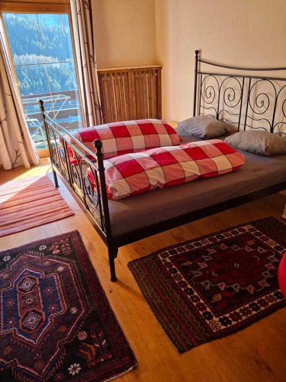 Postel nebo postele na pokoji v ubytování Chalet Catton Four bedroom appartement near Bad Kleinkirchheim