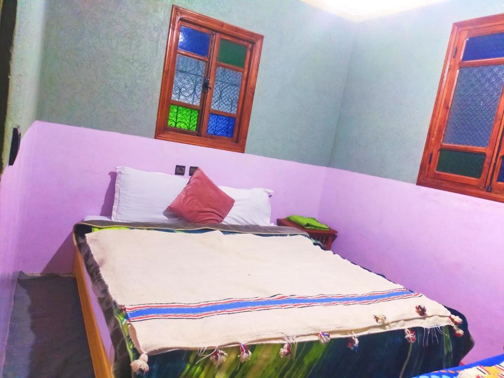 Postel nebo postele na pokoji v ubytování Gîte akioud mazik