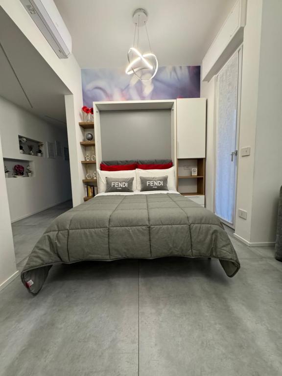 Postel nebo postele na pokoji v ubytování B&B Prestige