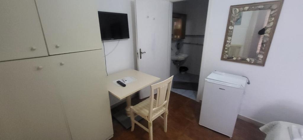 TV a/nebo společenská místnost v ubytování Hotel Dory
