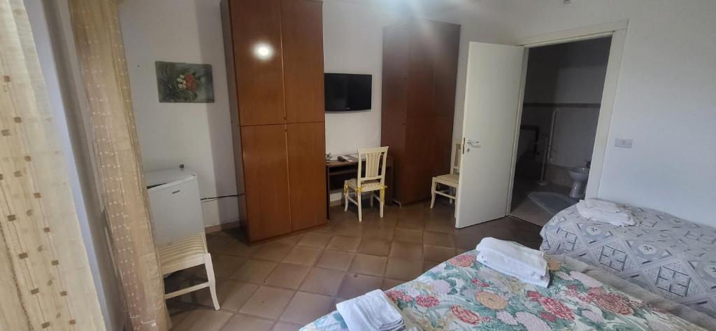 TV a/nebo společenská místnost v ubytování Hotel Dory