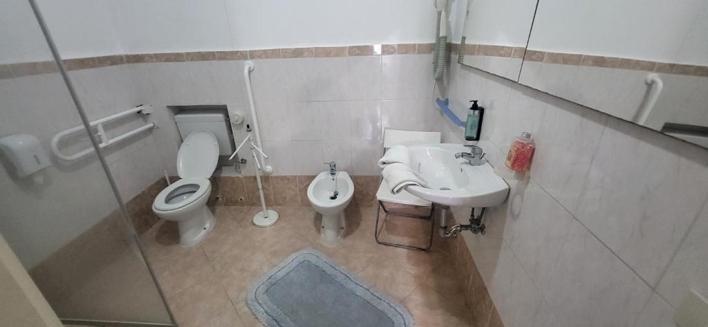 Koupelna v ubytování Hotel Dory