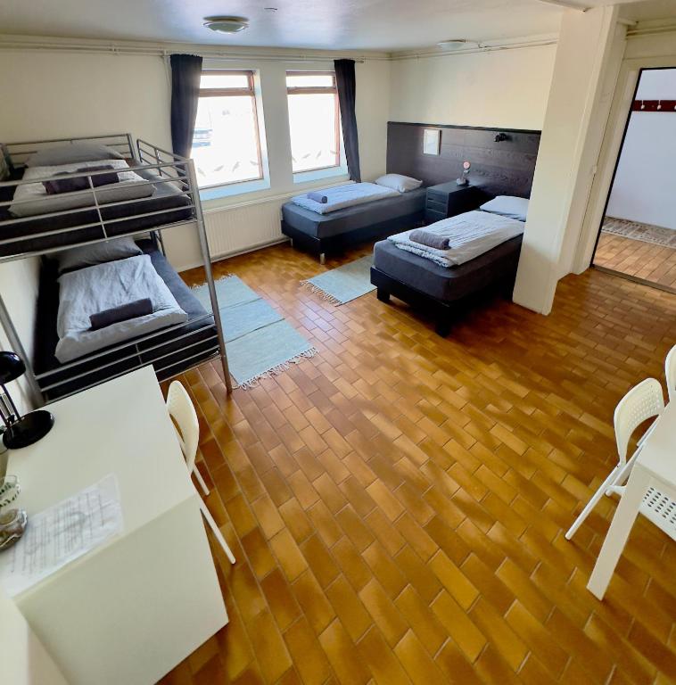 Voodi või voodid majutusasutuse Fisherinn Guesthouse toas