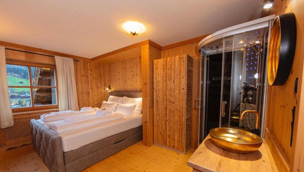 Posteľ alebo postele v izbe v ubytovaní Das Kitz - deLuxe ChaletApartments