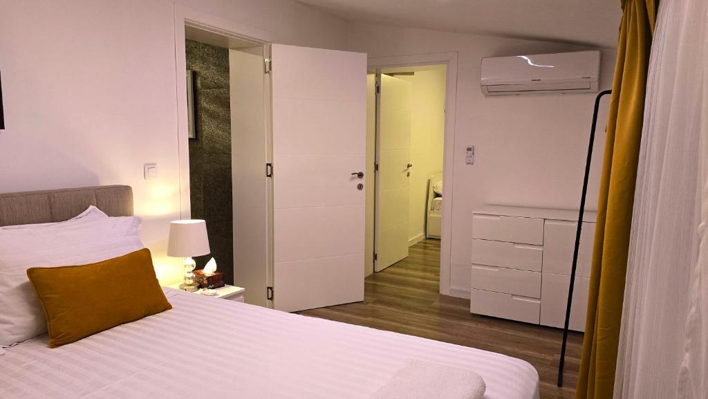 Postel nebo postele na pokoji v ubytování Morava 1 Asparuhovo Beach Holiday Home Apatment
