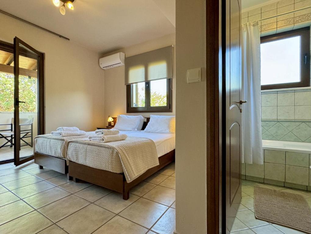 Postel nebo postele na pokoji v ubytování Villa Metapothia Gavalochori Crete