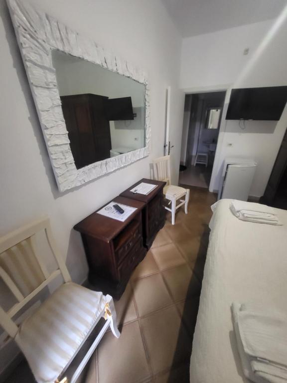 TV a/nebo společenská místnost v ubytování Hotel Dory