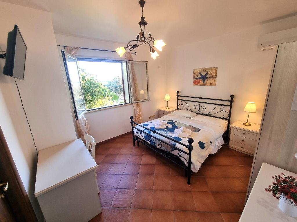 Posteľ alebo postele v izbe v ubytovaní B&B Villa Sant'Antonio