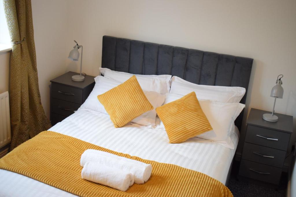 Ένα ή περισσότερα κρεβάτια σε δωμάτιο στο Lala lounge Stays