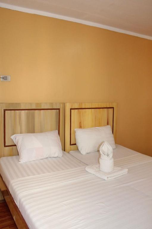 Postel nebo postele na pokoji v ubytování Agustin El Nido Inn