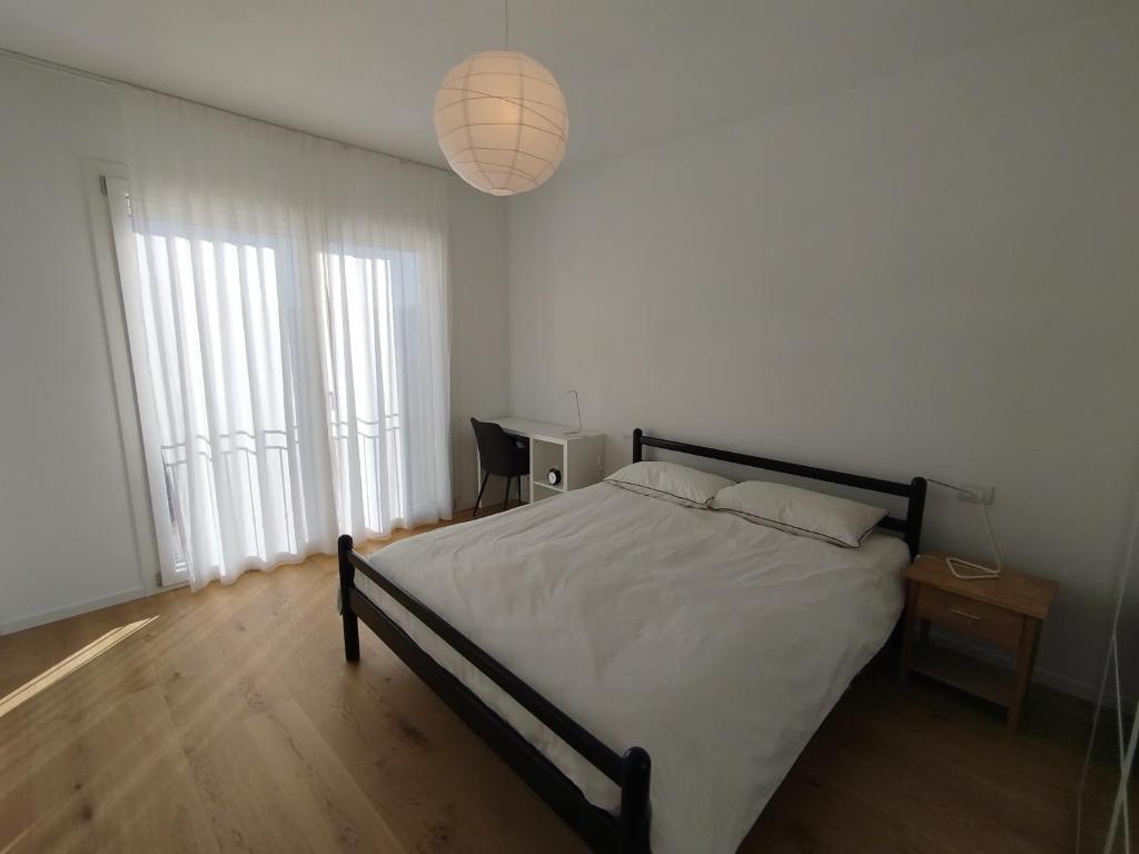 Postel nebo postele na pokoji v ubytování Agriturismo Casa Bregalda
