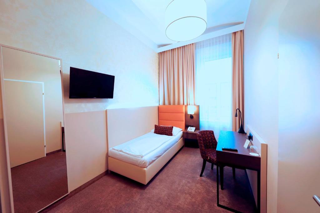 Televisor o centre d'entreteniment de Drei Kronen Hotel Wien City