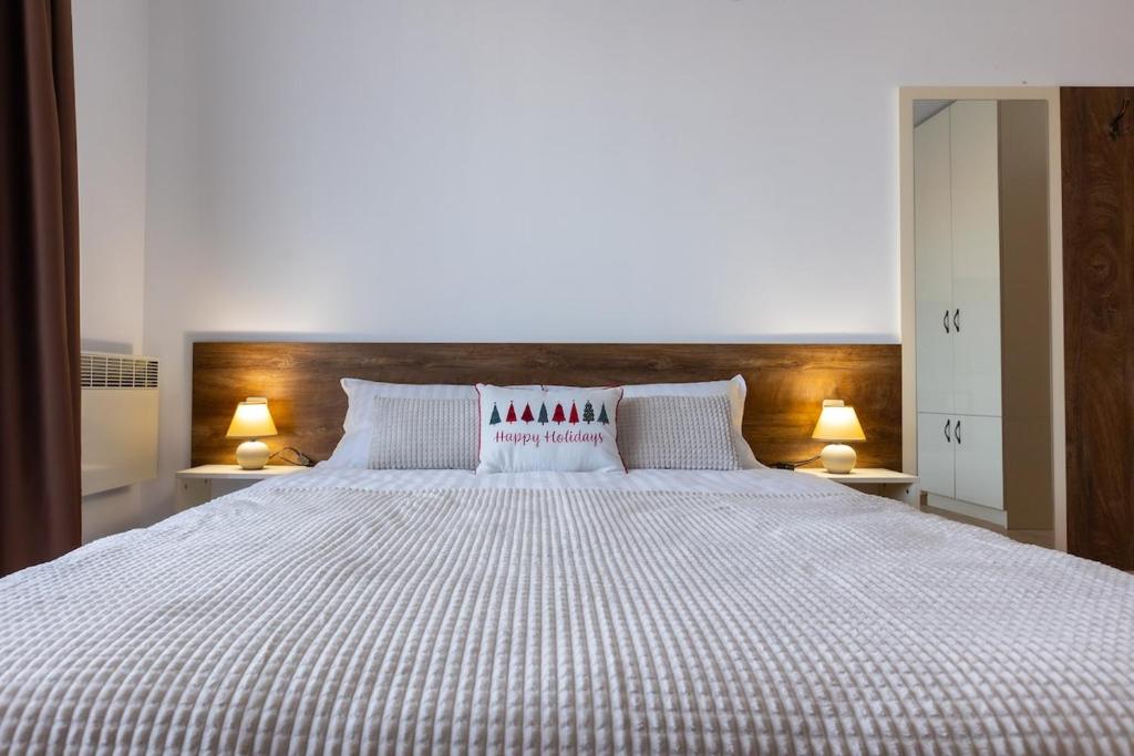 Ένα ή περισσότερα κρεβάτια σε δωμάτιο στο Divine mountain studio - parking - SPA