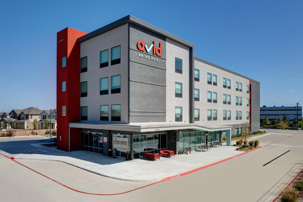 an office building with a va sign on it at avid hotel Austin NW - Lakeline by IHG in Austin