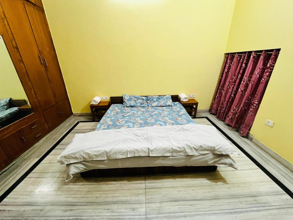 Postel nebo postele na pokoji v ubytování ReeGi Luxury Stay