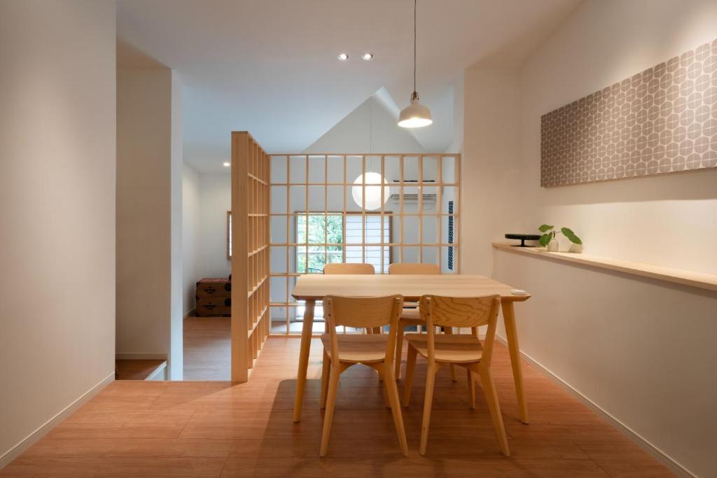 a kitchen and dining room with a table and chairs at Hana no kage - Vacation STAY 96334v in Sengokuhara