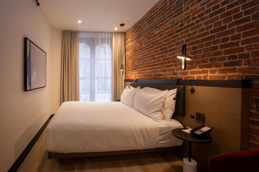 Le Petit Hotel Notre Dame - Standard-Queen-Zimmer