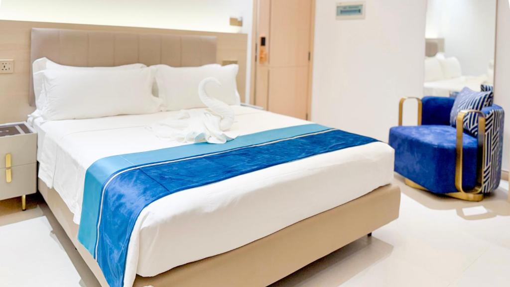 Postel nebo postele na pokoji v ubytování Aqua Heaven Inn