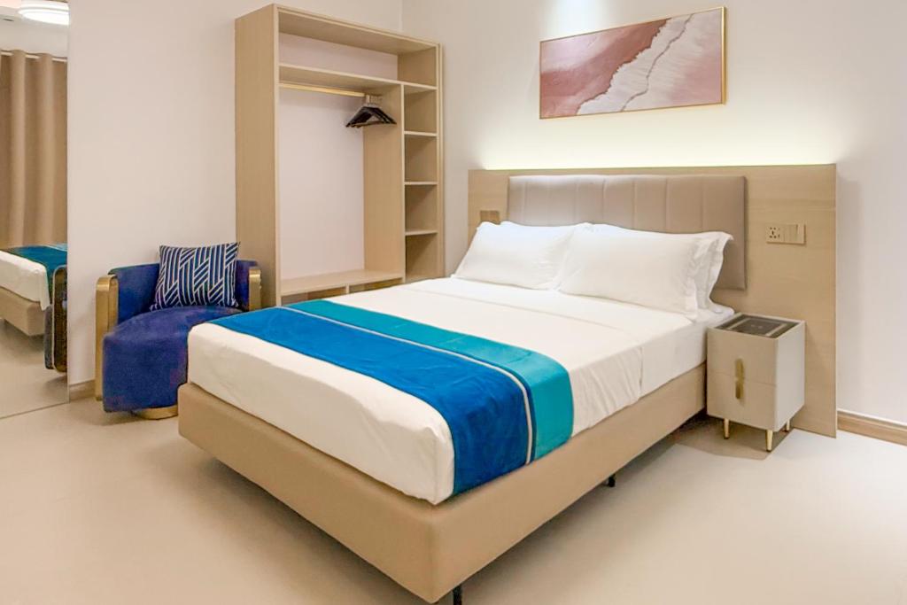 Postel nebo postele na pokoji v ubytování Aqua Heaven Inn