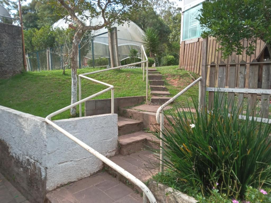 a set of stairs in front of a house at Arena da serra festy in Itapecerica da Serra
