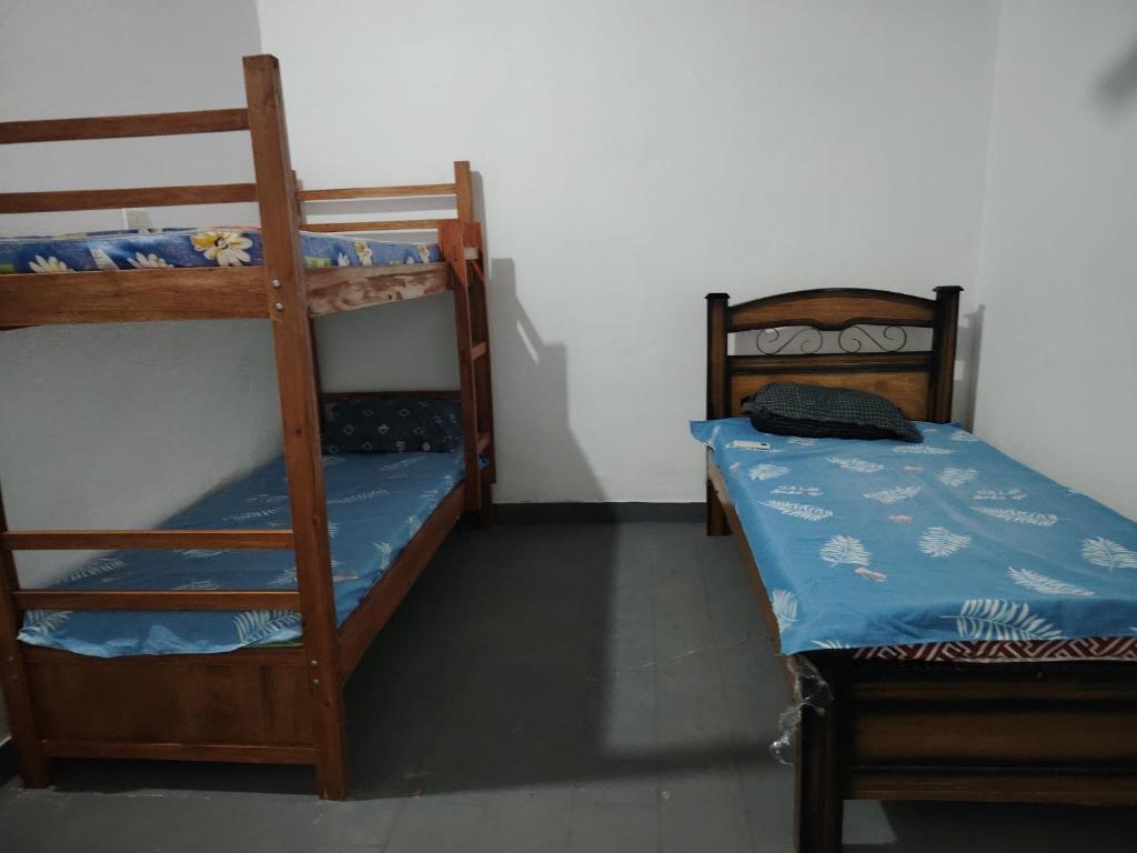 Postel nebo postele na pokoji v ubytování Quinta Manel