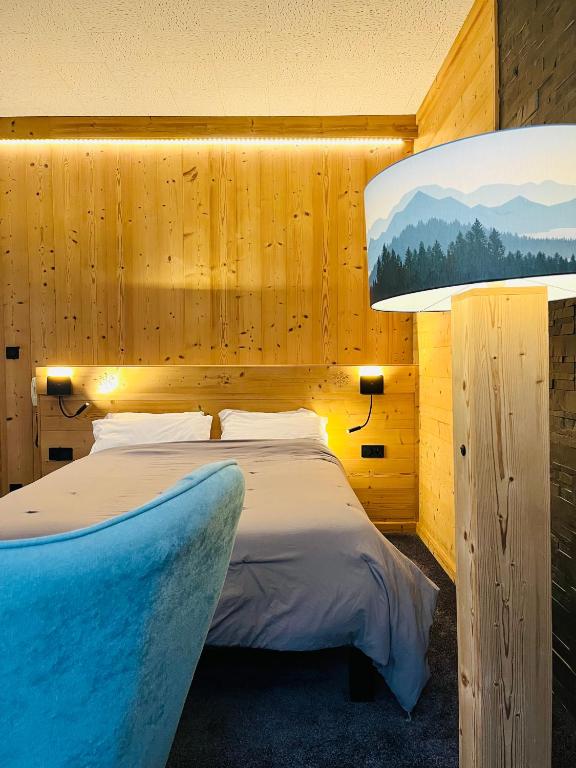 Postel nebo postele na pokoji v ubytování Hotel le Sacca, nouvelle équipe