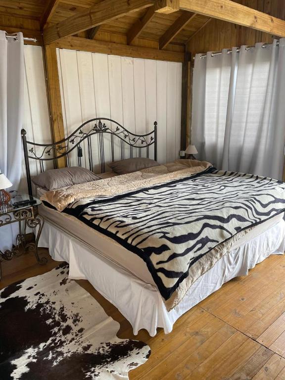 Postel nebo postele na pokoji v ubytování Pousada Portal Dos Campos