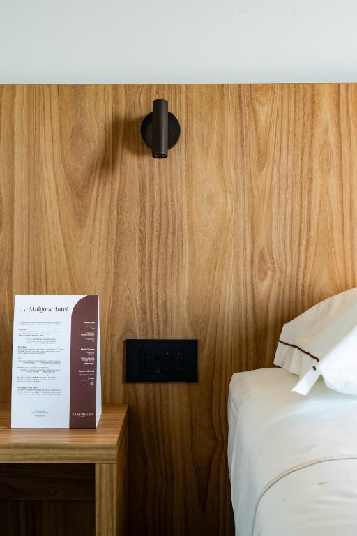 Postel nebo postele na pokoji v ubytování La Molgora Hotel