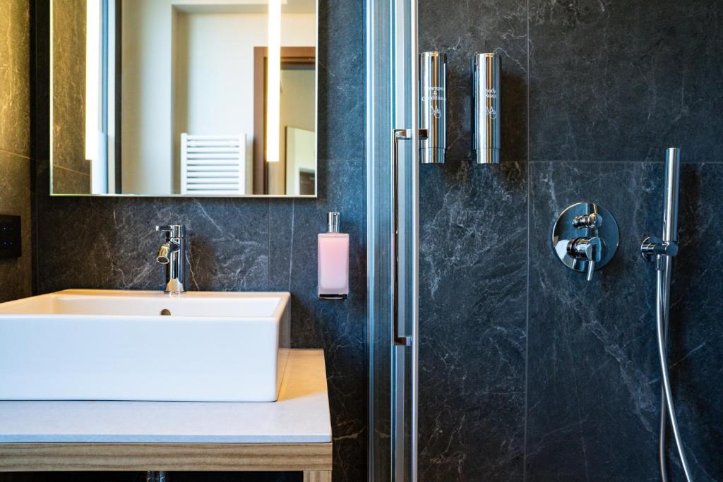Koupelna v ubytování La Molgora Hotel