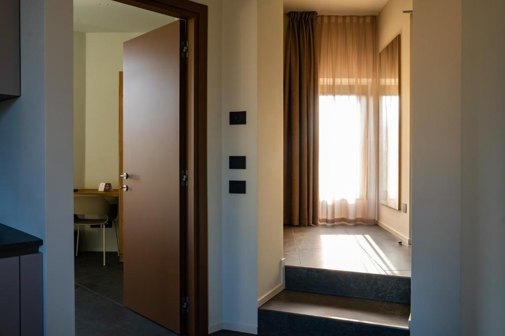 Postel nebo postele na pokoji v ubytování La Molgora Hotel