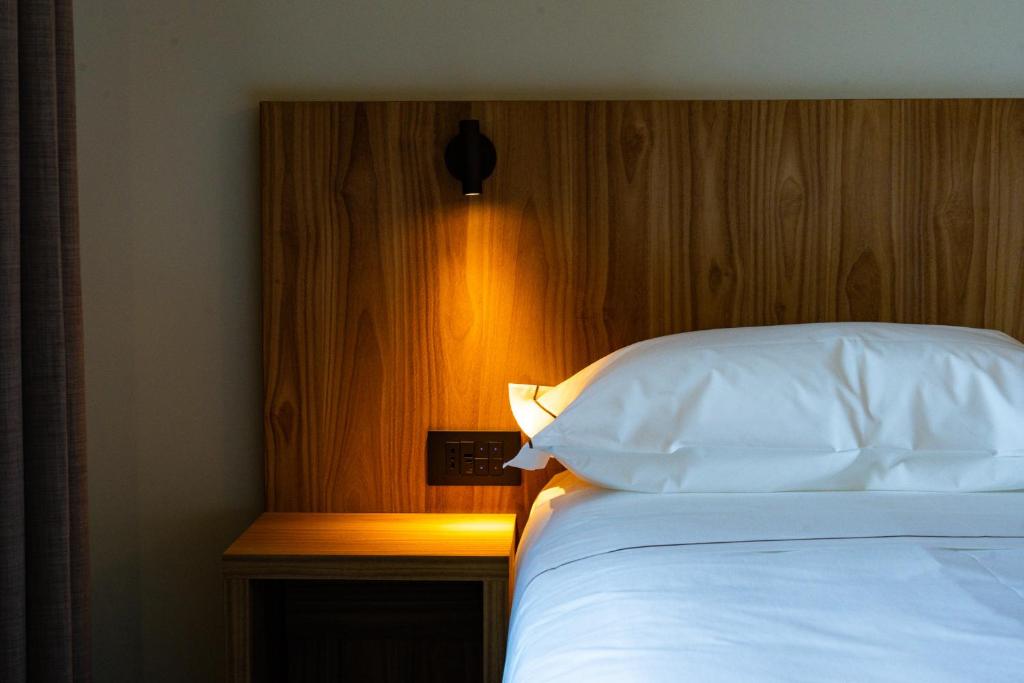 Postel nebo postele na pokoji v ubytování La Molgora Hotel