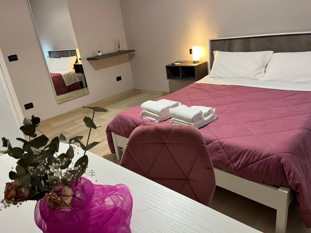 Ένα ή περισσότερα κρεβάτια σε δωμάτιο στο ILBE bed & breakfast