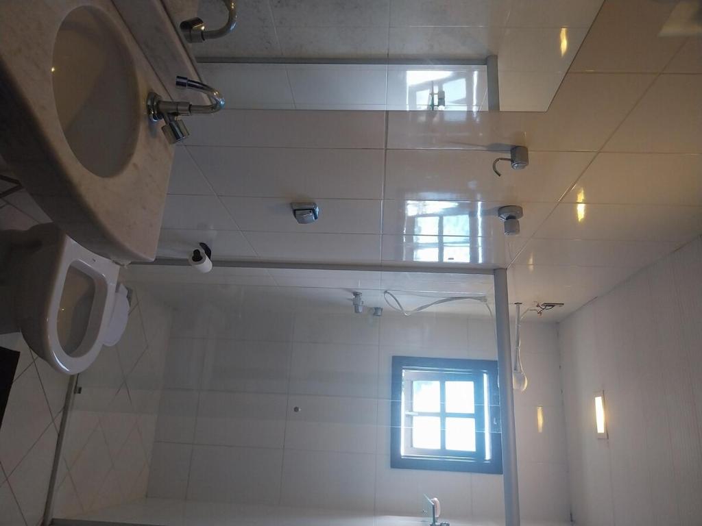 Koupelna v ubytování casa proximo pampulha