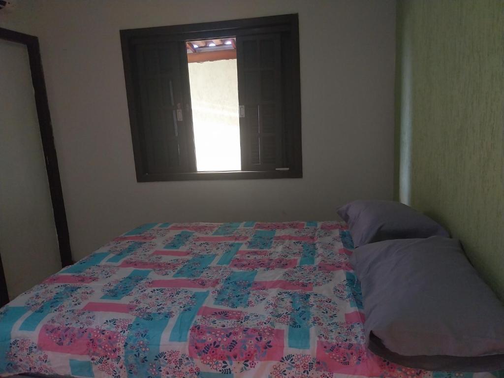 Postel nebo postele na pokoji v ubytování casa proximo pampulha