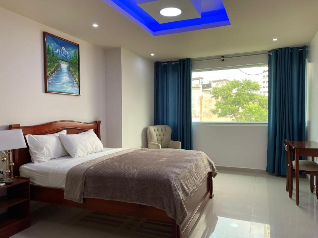 Postel nebo postele na pokoji v ubytování Fortune Hotel