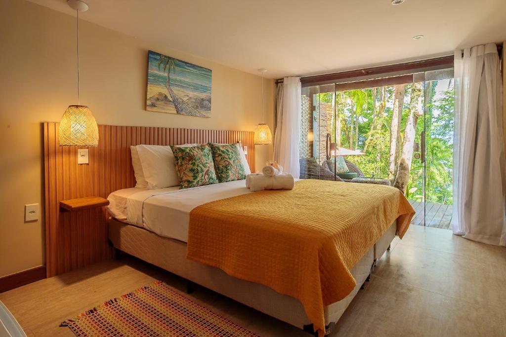 Cama ou camas em um quarto em Pousada Lagamar