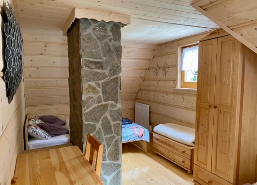 En eller flere senge i et værelse på CypiSówka