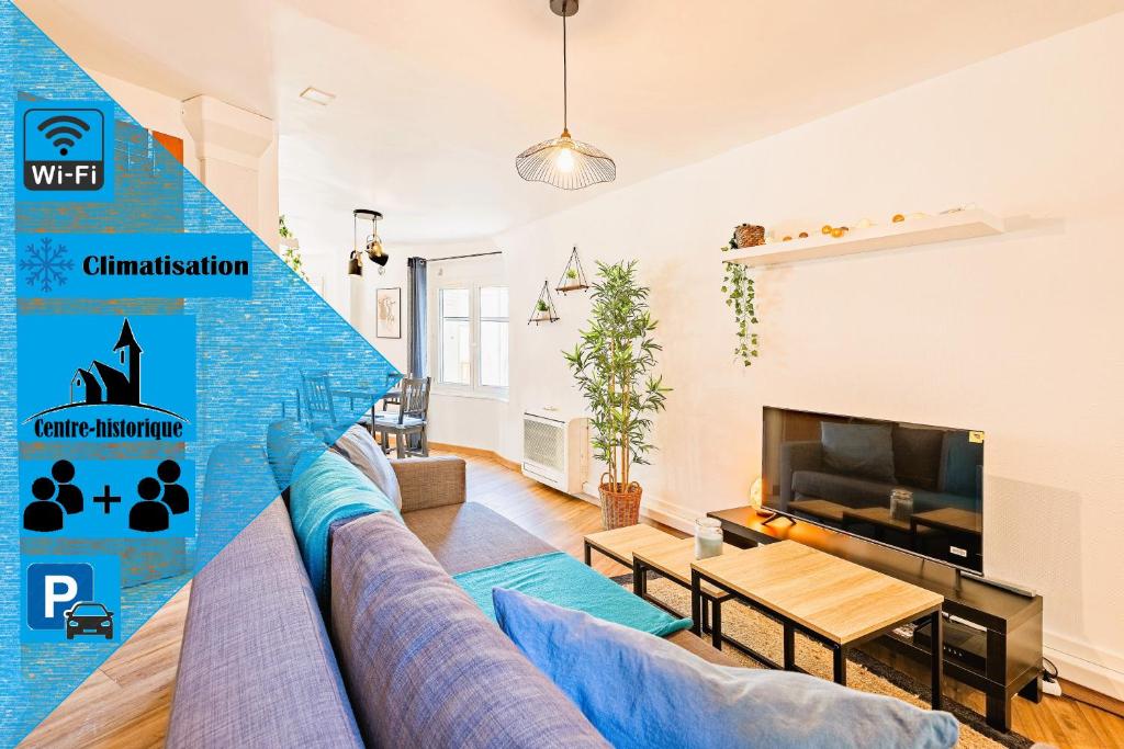 un salon avec un canapé et une télévision dans l'établissement T2 Cathédrale & Torre Ventosa - Central - Clim - Wifi - Balcon - Free parking sur demande, à Béziers