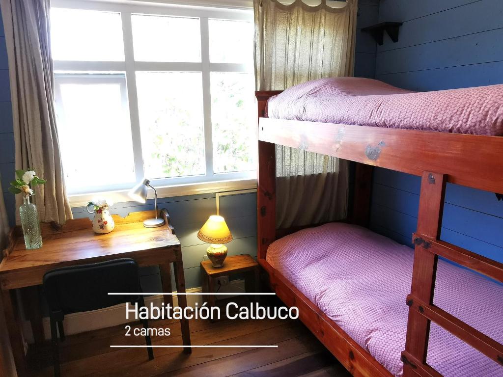 Postel nebo postele na pokoji v ubytování MaPatagonia Hostel Casa Historica