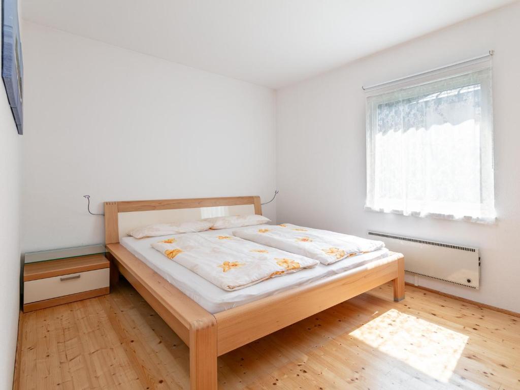 Postel nebo postele na pokoji v ubytování Ferienidyll Kufstein