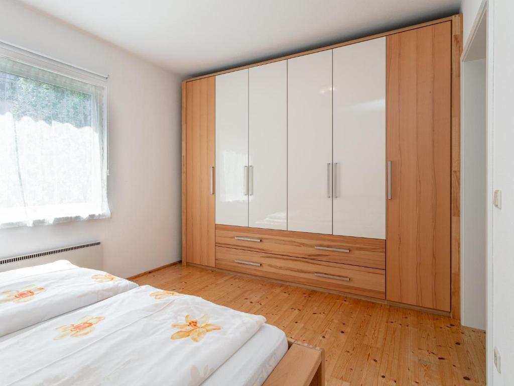 Postel nebo postele na pokoji v ubytování Ferienidyll Kufstein