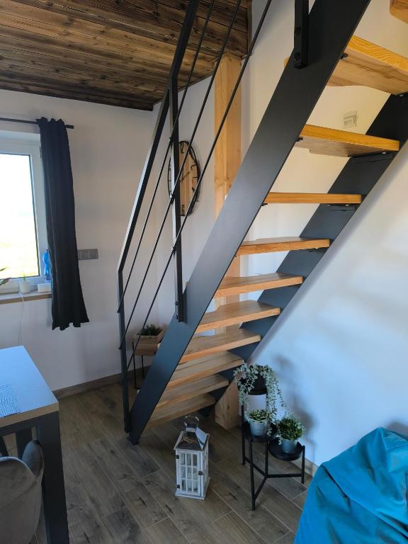 Postel nebo postele na pokoji v ubytování Horský apartmán Stříbrnice